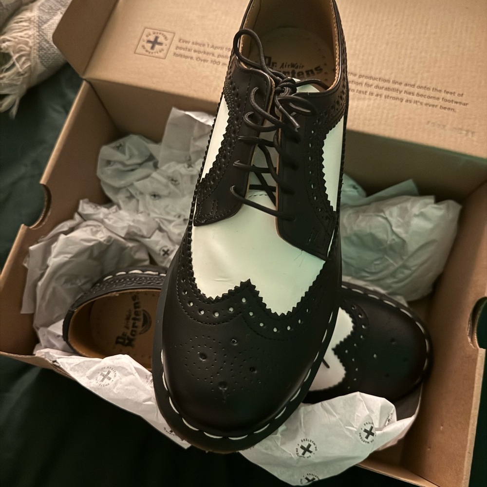 Dr. Martens Black and White Wingtip Loafers